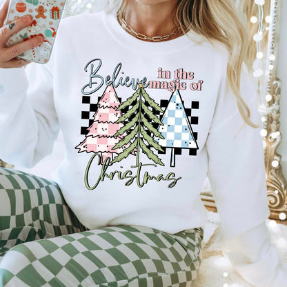 BELIEVE IN THE MAGIC OF CHRISTMAS CREWNECK SWEATSHIRT