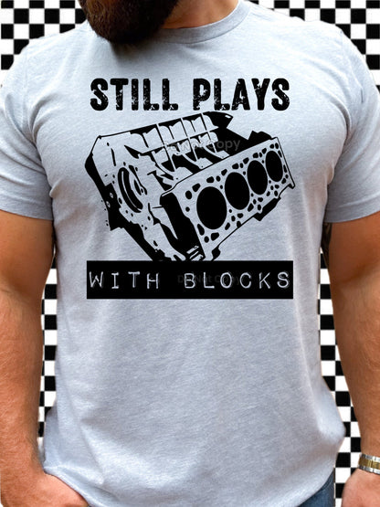 STILL PLAYS WITH BLOCKS TEE